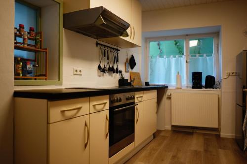 Køkken eller tekøkken på Nicole's kleine Schwedenstube