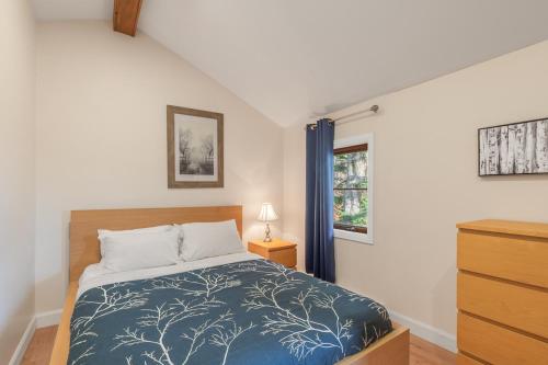 Ένα ή περισσότερα κρεβάτια σε δωμάτιο στο Chalets Alpins - 17 Chemin Alpin