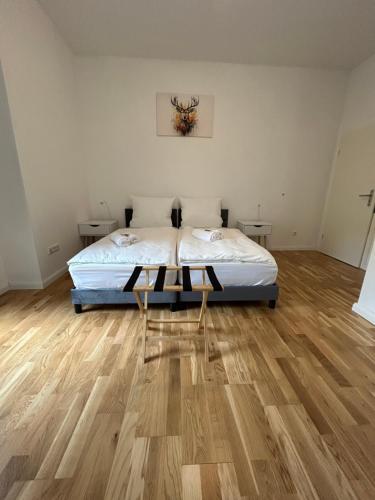 Giường trong phòng chung tại BnbRetreat am Schloss Schwetzingen