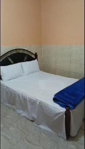 Ένα ή περισσότερα κρεβάτια σε δωμάτιο στο Appartement familial en sous-sol près des chutes d'Ouzoud, confortable et sûr