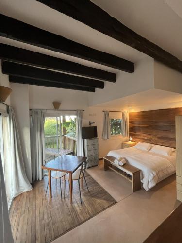 Ένα ή περισσότερα κρεβάτια σε δωμάτιο στο Geko Apart Hotel