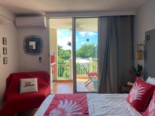 Una cama o camas en una habitación de Tahiti in Tartane