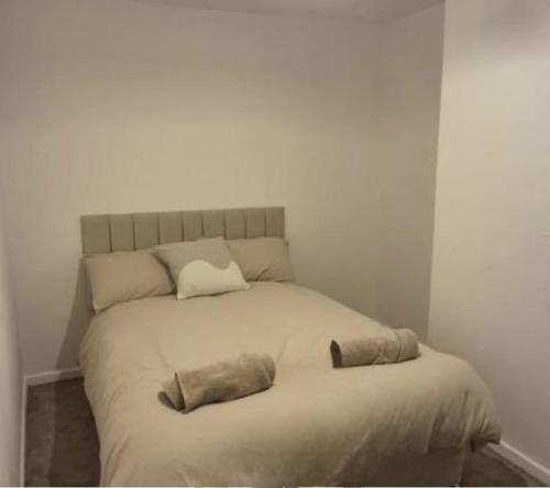 Ένα ή περισσότερα κρεβάτια σε δωμάτιο στο Cozy 2 Bedroom Macclesfield House