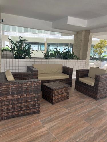 Posezení v ubytování Apto Tombo Guarujá 2quartos pé na areia e vaga