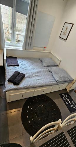 Ένα ή περισσότερα κρεβάτια σε δωμάτιο στο Le cœur d'Arras 1