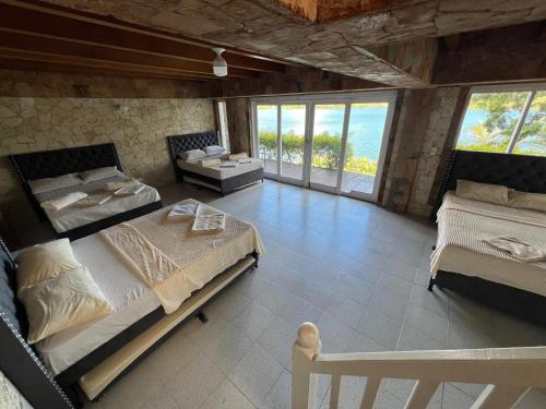 Postel nebo postele na pokoji v ubytování Finca Vista Hermosa