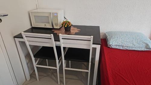 Ένα ή περισσότερα κρεβάτια σε δωμάτιο στο Cantinho da Praia