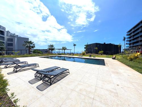 Sky-High Elegance Top-Floor Views of City, Ocean & Sunrise