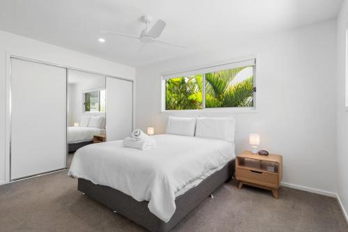 En eller flere senge i et værelse på 44 Allura Circuit