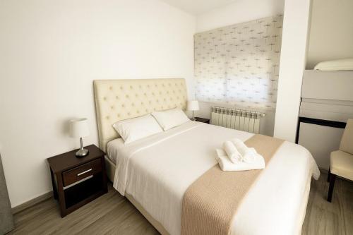 Ένα ή περισσότερα κρεβάτια σε δωμάτιο στο Three-Bedroom Apartment with Stunning Views