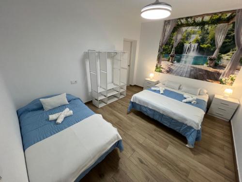 Postel nebo postele na pokoji v ubytování Casa las Cordobesas alojamiento rural