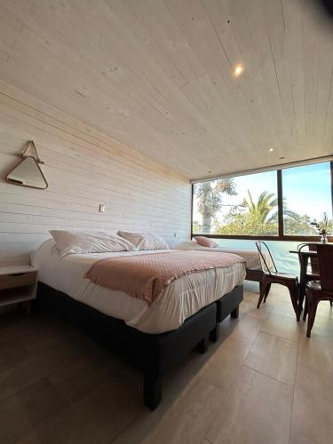 Ένα ή περισσότερα κρεβάτια σε δωμάτιο στο Hotel Casa Surf