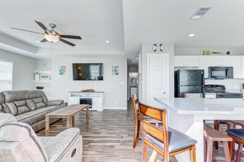a living room with a couch and a table at A Quietude in Gilchrist
