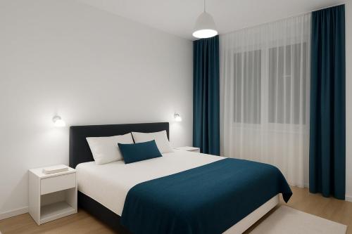 Ένα ή περισσότερα κρεβάτια σε δωμάτιο στο Cozy Apartment Skopje