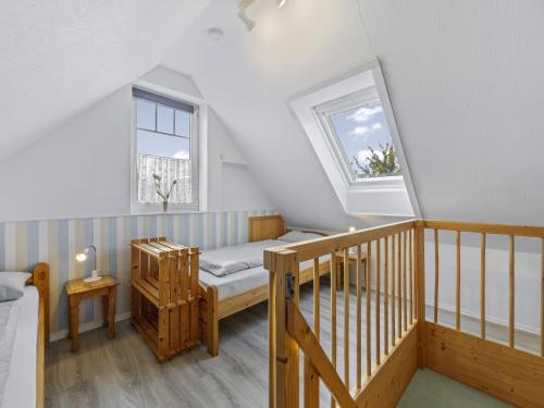 Voodi või voodid majutusasutuse Nordlicht - Windjammer toas