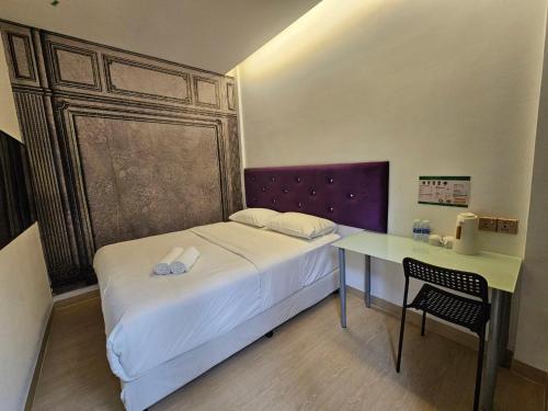 Postel nebo postele na pokoji v ubytování VG Homes