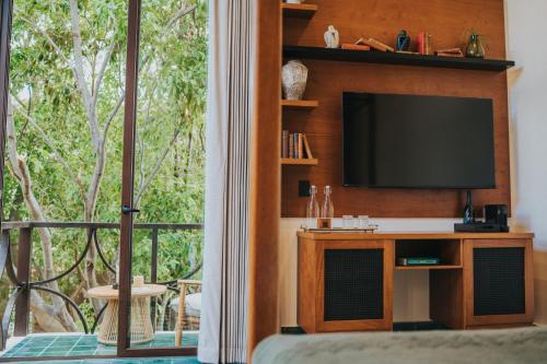 TV a/nebo společenská místnost v ubytování CIGNO Mejorada