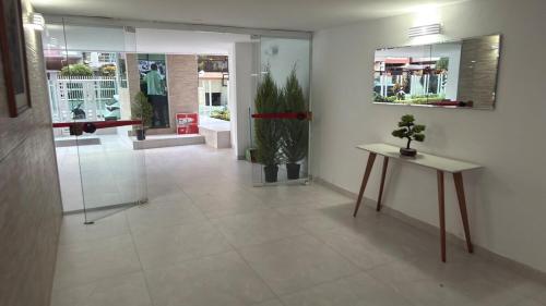 Ο χώρος του λόμπι ή της ρεσεψιόν στο Apt 711 - Elegância com vista parcial do mar