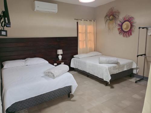 Ένα ή περισσότερα κρεβάτια σε δωμάτιο στο Casa Villa Klala