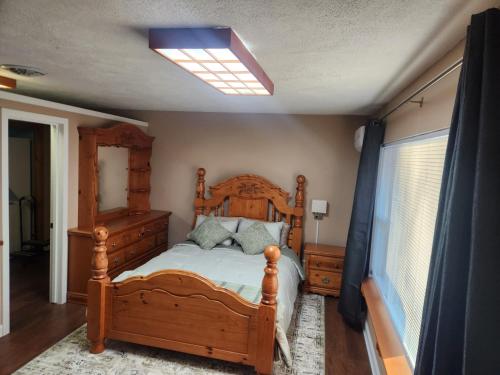 Postel nebo postele na pokoji v ubytování The Leafy Green Country Studio