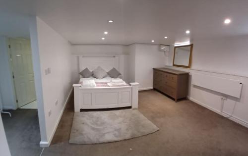 Ένα ή περισσότερα κρεβάτια σε δωμάτιο στο Shetcliffe Lodge