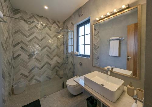 Ένα μπάνιο στο Beach front villa Ashwem Ocean