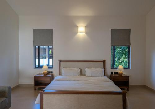 Ένα ή περισσότερα κρεβάτια σε δωμάτιο στο Beach front villa Ashwem Ocean