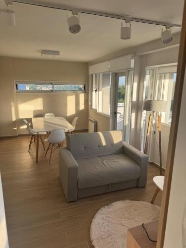 Et opholdsområde på Depto 6p , 1 dormitorio mas sofá cama en living