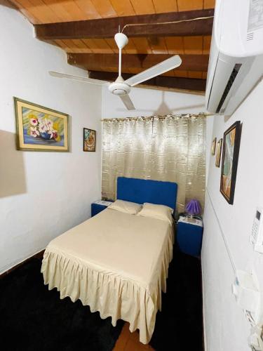 Ένα ή περισσότερα κρεβάτια σε δωμάτιο στο Alojamiento DOÑA PERLA