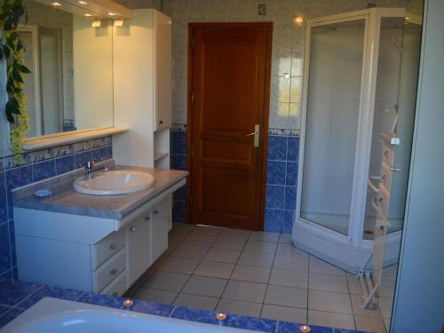 a bathroom with a sink and a shower at Maison de campagne avec 6 chambres, jardin clos, cheminée, proche de la mer, animaux acceptés - FR-1-376-3 in Wierre-Effroy