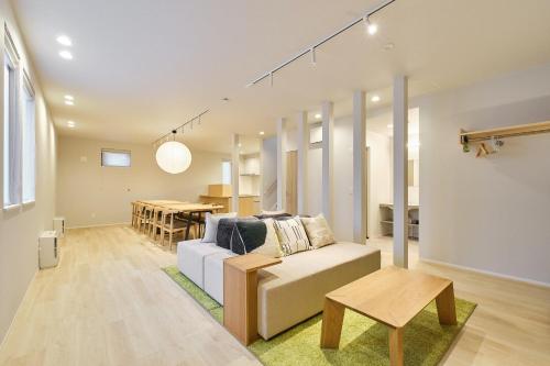 Posezení v ubytování 星宿 Asahikawa Miyashita