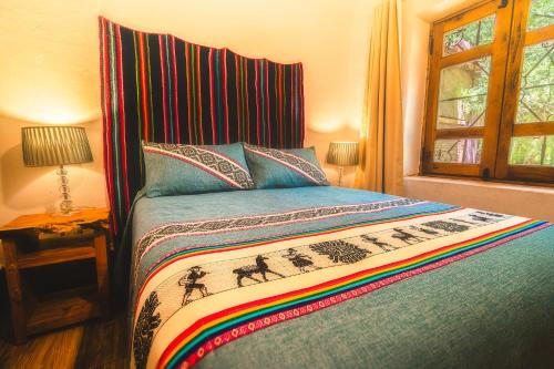 Postel nebo postele na pokoji v ubytování Ckoi Atacama Lodge