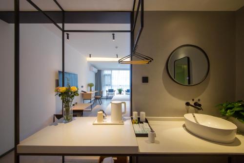 Koupelna v ubytování Zhangjiajie Clamshell Youth Hotel