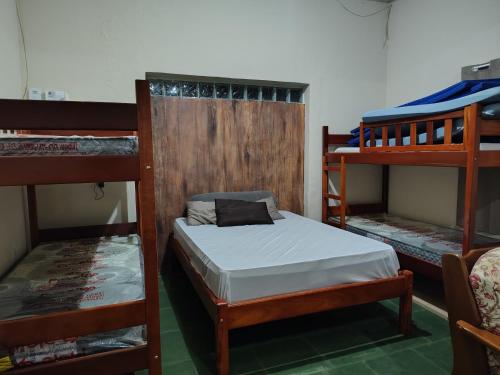 Ένα ή περισσότερα κρεβάτια σε δωμάτιο στο Caza di Maria a beira rio