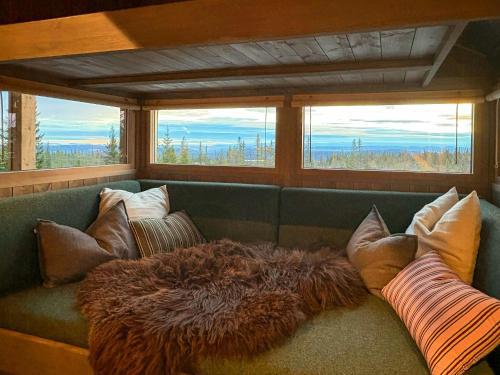 Χώρος καθιστικού στο Design Cabin With Panoramic Views Near Sjusjøen