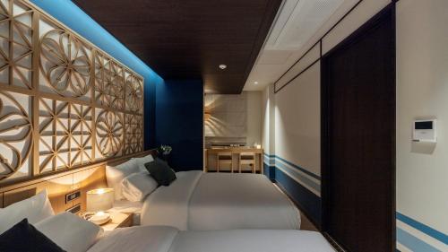 Postel nebo postele na pokoji v ubytování Stay Passport Okinawa Ryokan Incheon Bupyeong