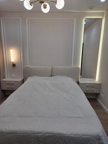 Ένα ή περισσότερα κρεβάτια σε δωμάτιο στο Liberty