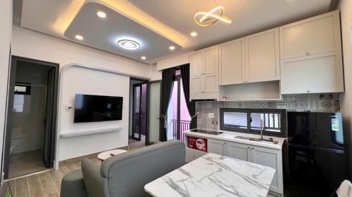 Η κουζίνα ή μικρή κουζίνα στο Tâm Dung Apartment