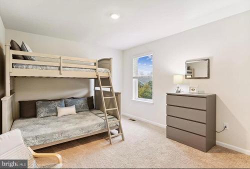 Voodi või voodid majutusasutuse Large new beautiful house 1 and half miles to beach toas