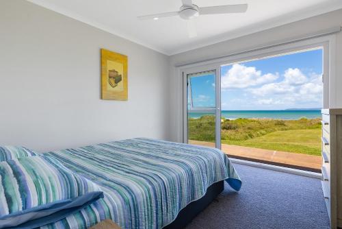 Postel nebo postele na pokoji v ubytování Beachcombers Rest - Tokerau Beach Escape