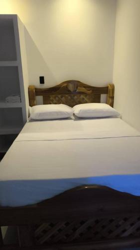 Ένα ή περισσότερα κρεβάτια σε δωμάτιο στο Hotel coral Issa