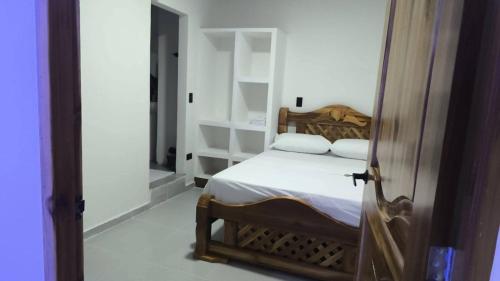 Ένα ή περισσότερα κρεβάτια σε δωμάτιο στο Hotel coral Issa