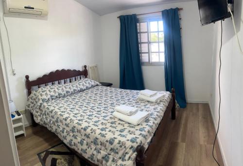 Ένα ή περισσότερα κρεβάτια σε δωμάτιο στο Mi Departamentito