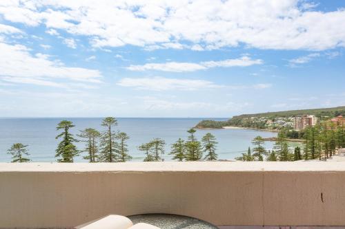 a view of the ocean from a balcony at Modern Manly Apartment with Stunning Views, Pool in Sydney