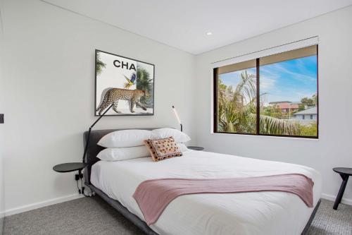 Ένα ή περισσότερα κρεβάτια σε δωμάτιο στο North-East Facing Modern 2-bed Apartment