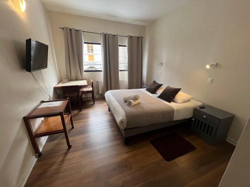 Ένα ή περισσότερα κρεβάτια σε δωμάτιο στο Hotel Sky Center