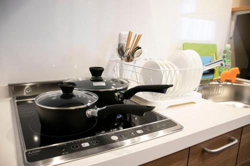 Kuchyň nebo kuchyňský kout v ubytování Hotel S-Presso West - Vacation STAY 9085