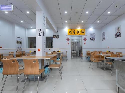 Restaurace v ubytování Shell Hotel Taixing Huangqiao Town Dinghui Road