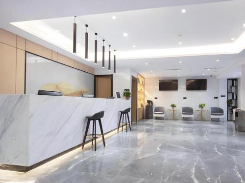 TV a/nebo společenská místnost v ubytování GreenTree Inn Express Shangqiu Beihai Road South Railway Station