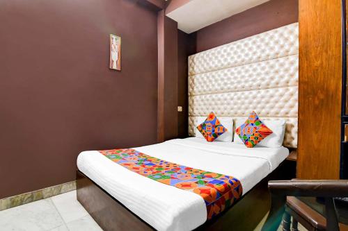 Una cama o camas en una habitación de Hotel GP Stays